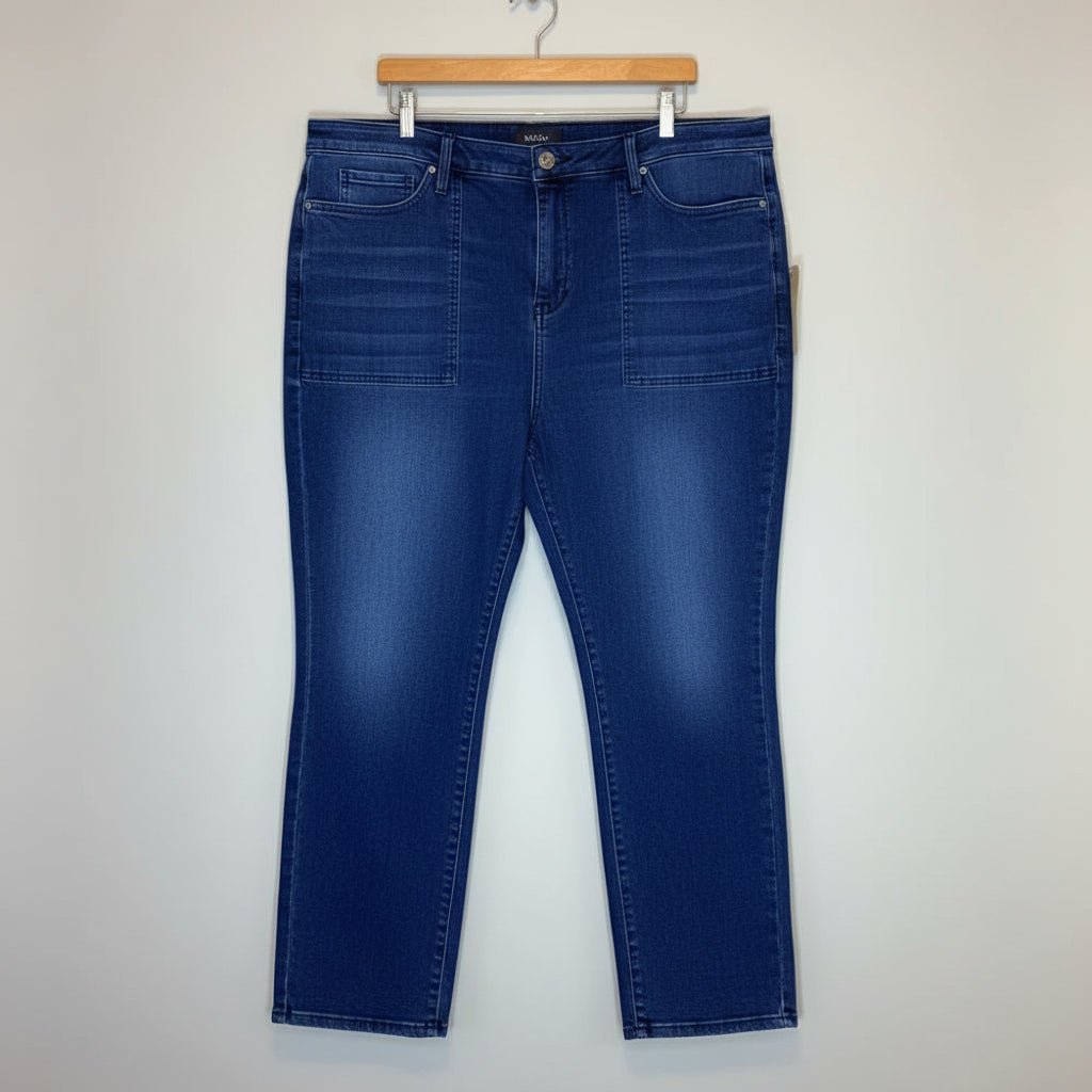 Blue jeans hanging on a wooden hanger against a rustic wooden background