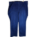 Blue jeans hanging on a wooden rack against a light wooden panel background