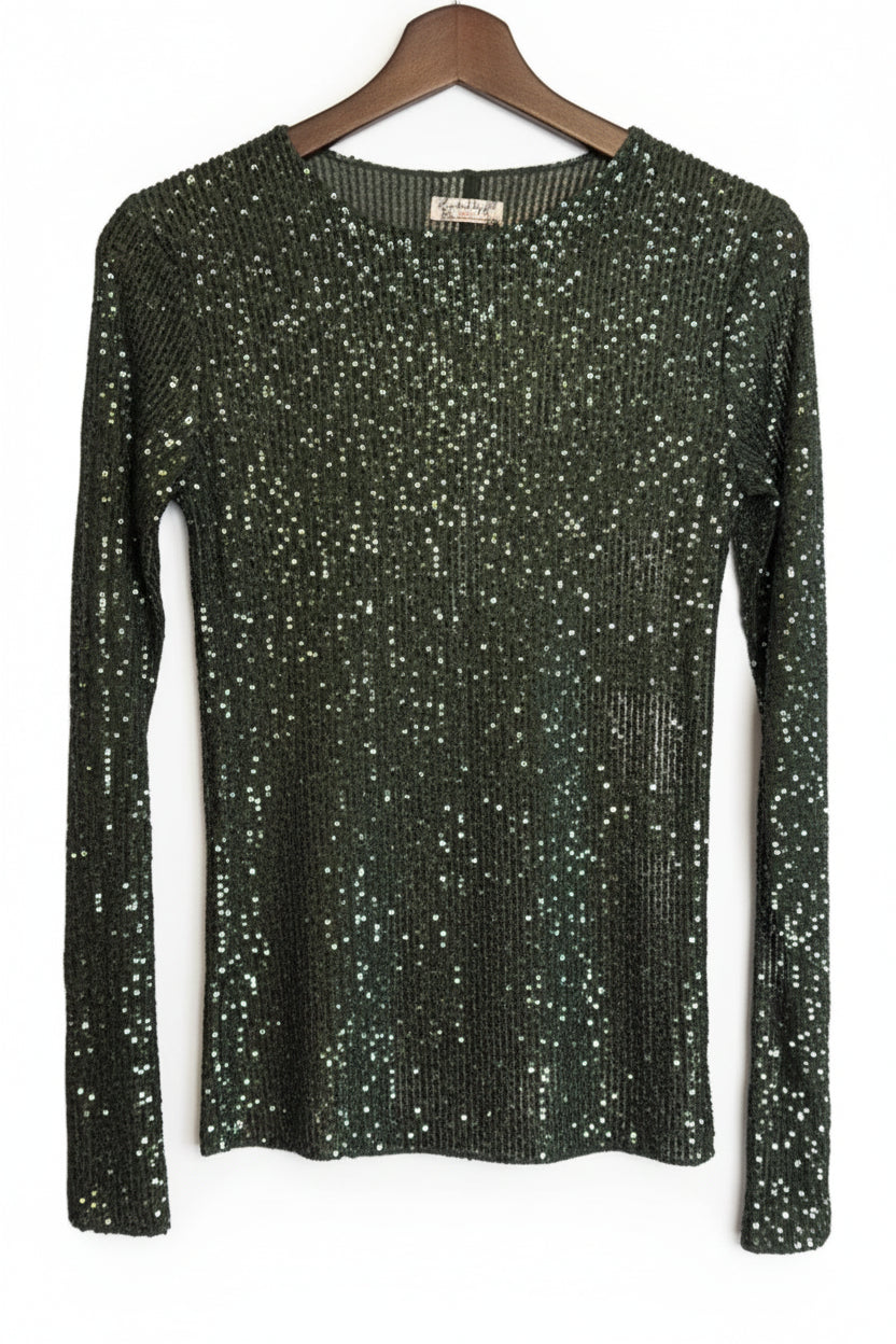 Black sequin sweater on a hanger against a white background