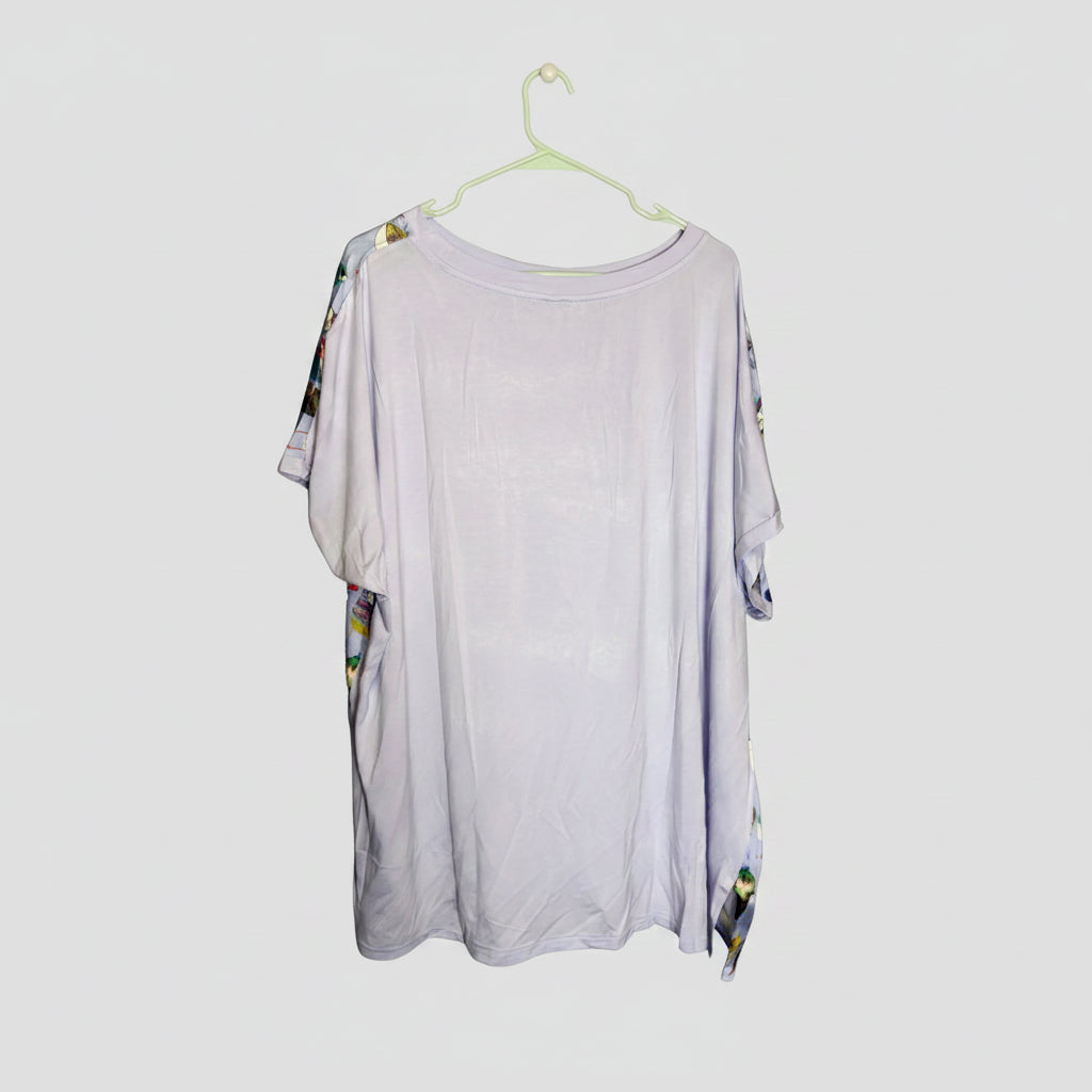 Lavender t-shirt with colorful sleeves on a white background