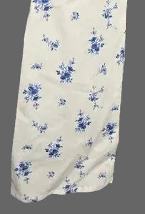 Close up of floral fabric print and sleeve