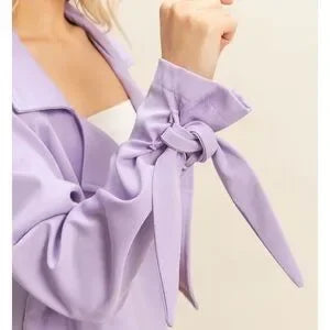 Close up of tie cuff detail on HYFVE lilac jacket sleeve
