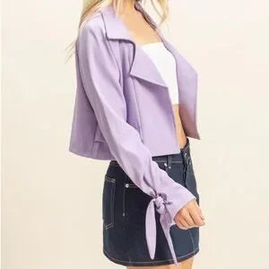 Side view of HYFVE lilac tie cuff jacket