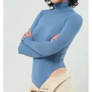 Side view of gray-blue turtleneck bodysuit